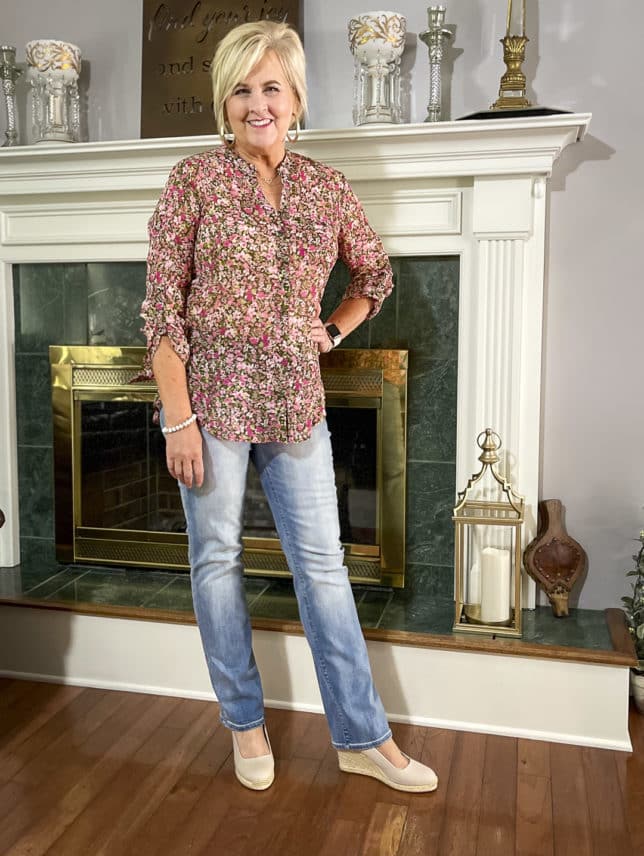 Fashion Blogger 50 Is Not Old is wearing a Kut From The Kloth floral button-up blouse with bootcut jeans and neutral wedge espadrilles