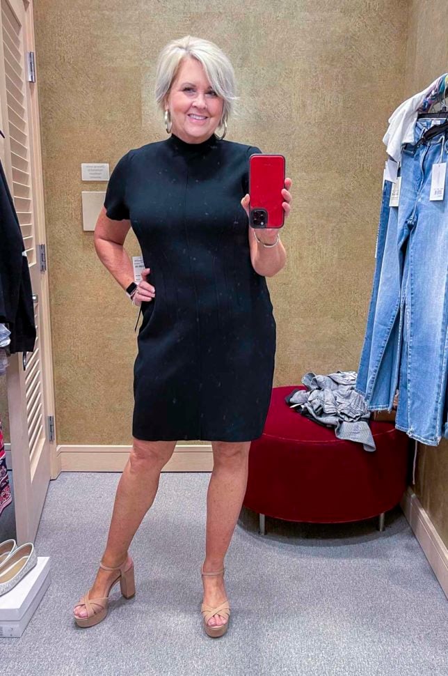 Fashion Blogger 50 Is Not Old is wearing a black sweater dress with neutral suede heels from the Nordstrom Sale 