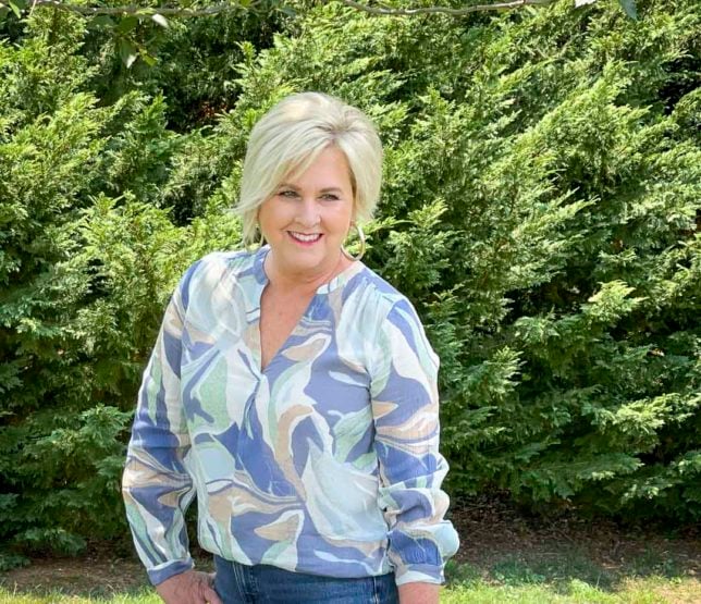 Fashion Blogger 50 Is Not Old is wearing a v-neck long sleeve top