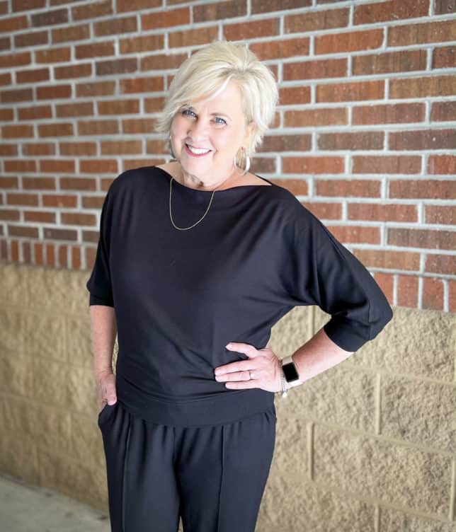 Over 40 Fashion Blogger, Tania Stephens is styling a casual weekend outfit of a black boat-neck top