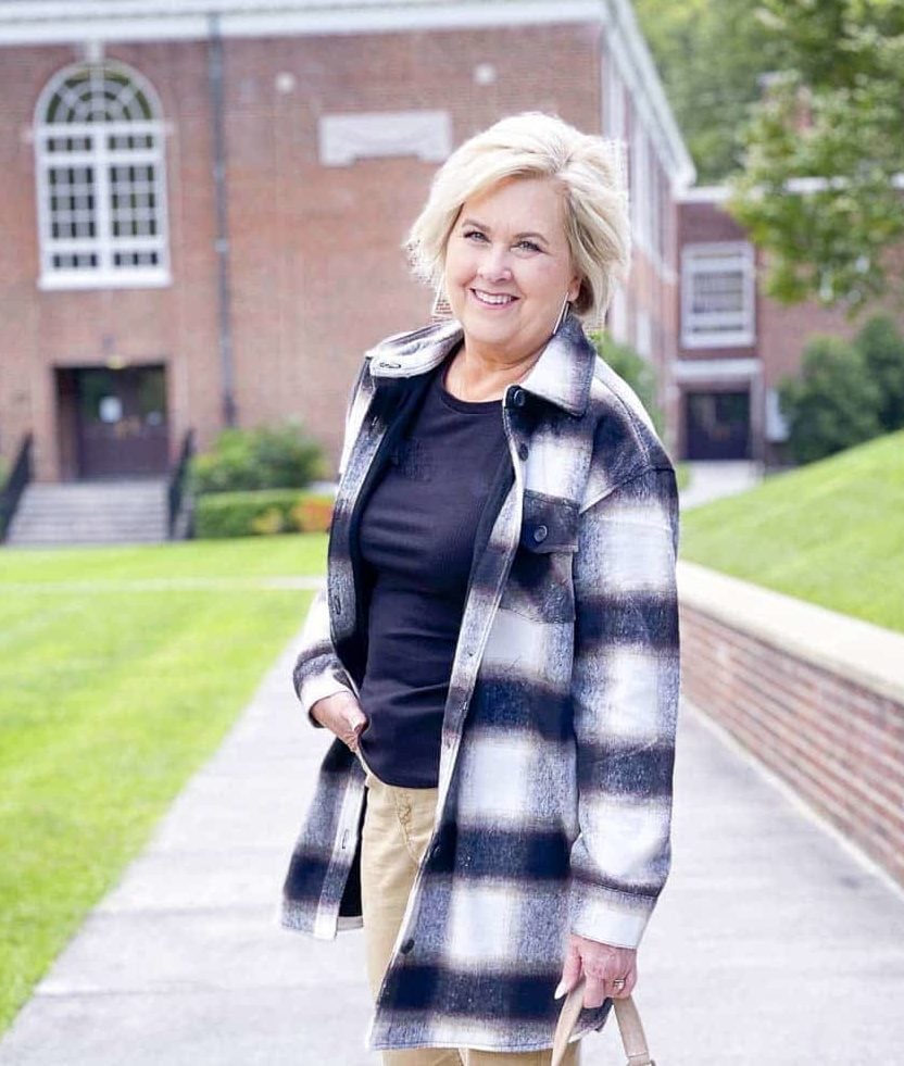 Over 40 Fashion Blogger, Tania Stephens is wearing a shacket with a black top