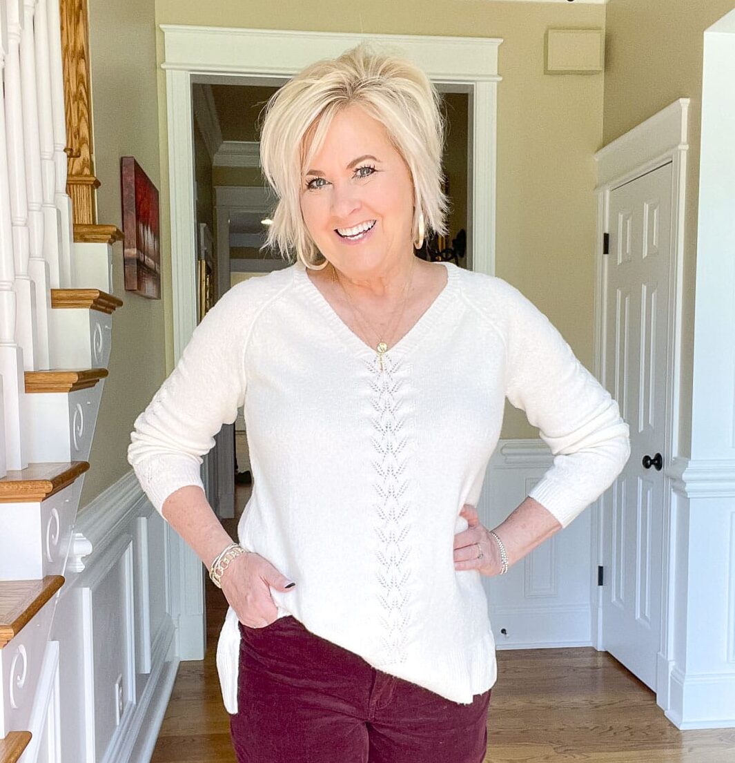 Over 40 fashion blogger, Tania Stephens, is wearing a cream Pointelle sweater