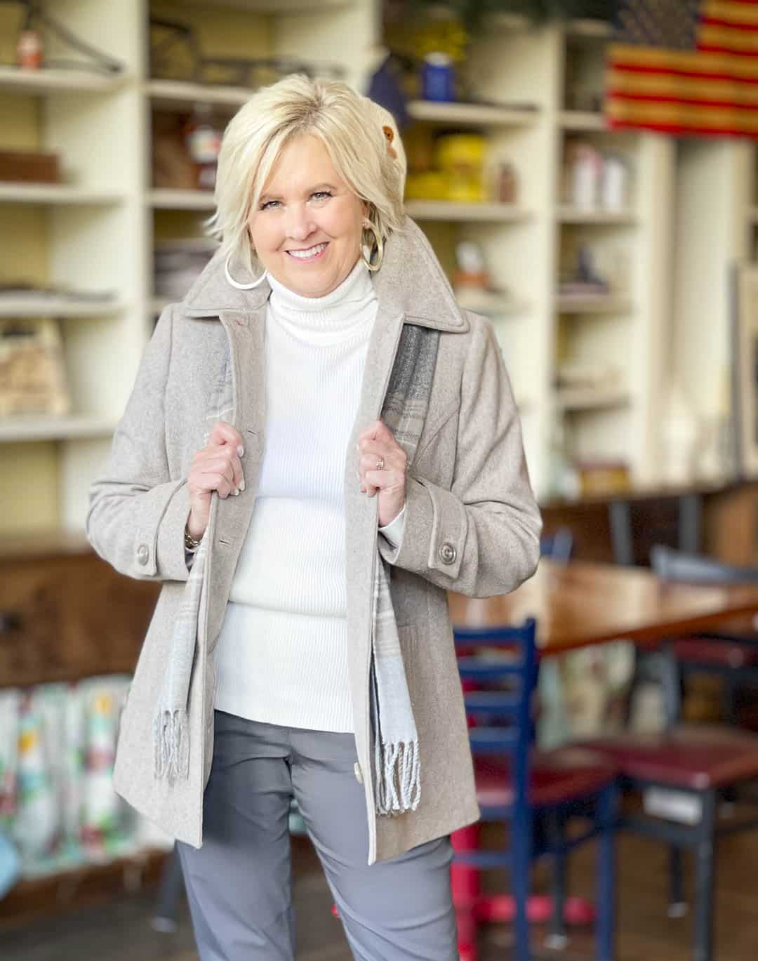 Over 40 Fashion Blogger, Tania Stephens, is ready for coat wearing season in this taupe coat and plaid scarf from Appleseed's