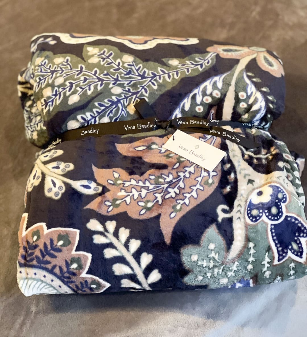 Over 40 fashion blogger, Tania Stephens is showing a Navy plush king size blanket from Vera Bradley