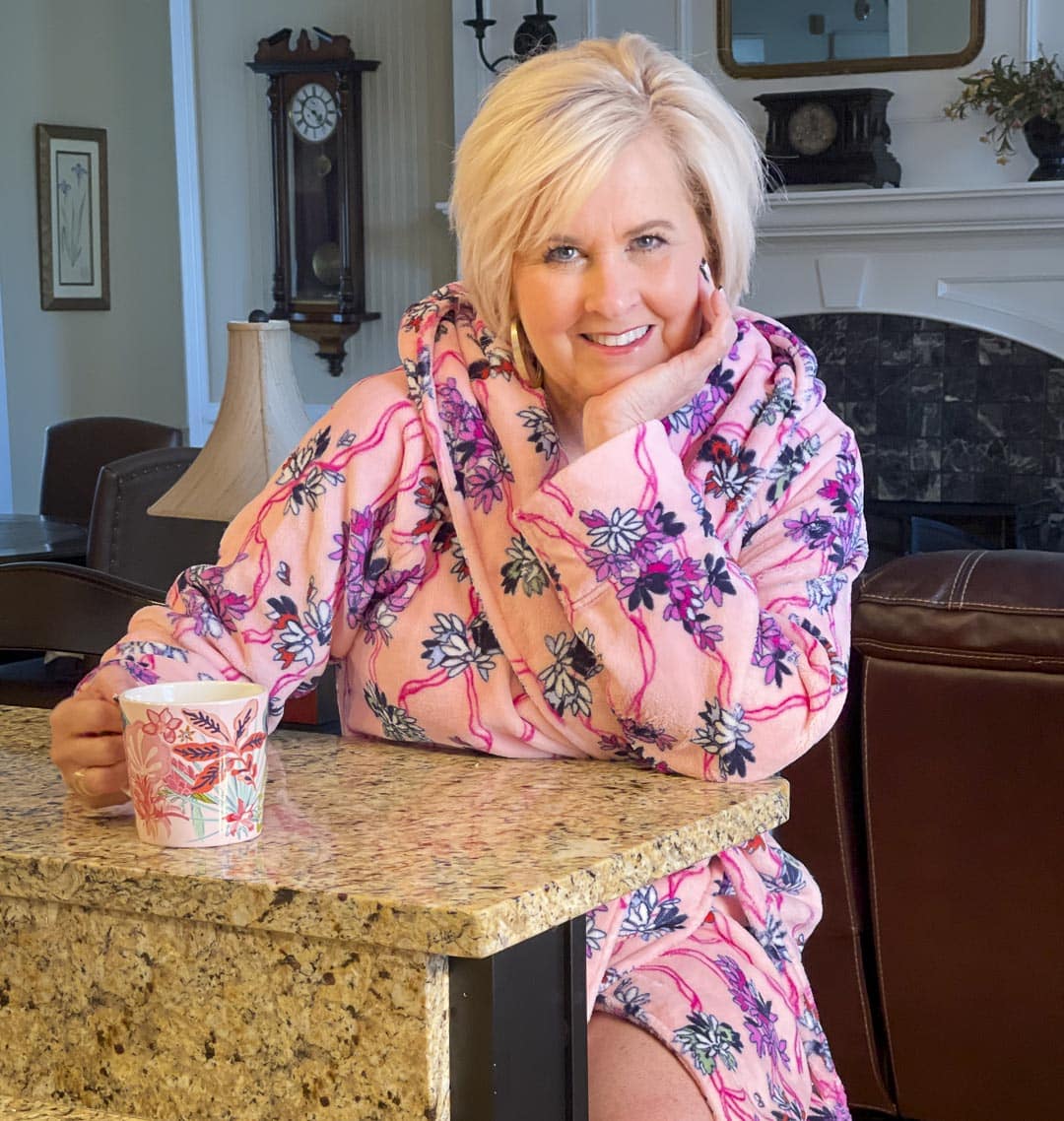 Over 40 fashion blogger, Tania Stephens is staying warm on cold rainy mornings in a Hope Blooms Pink robe from Vera Bradley