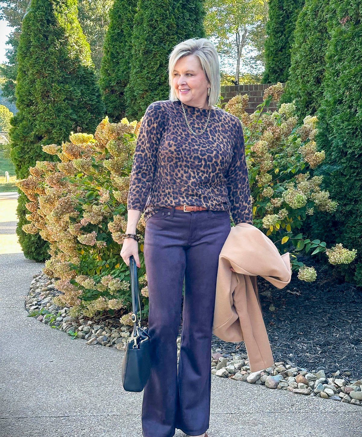 Over 50 Fashion Blogger, Tania Stephens is showing how to style one pair of pants five ways for fall 59