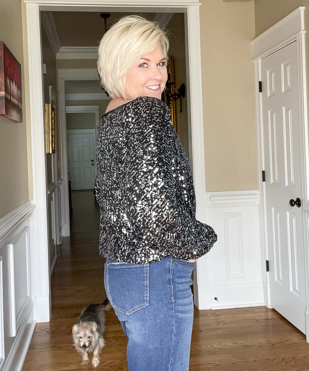 Over 40 Fashion Blogger, Tania Stephens is showing the back of a charcoal sequined top