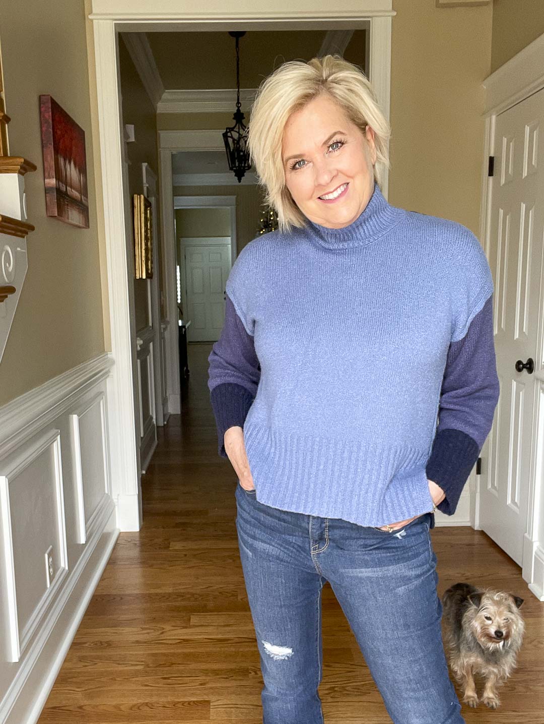 Over 40 Fashion Blogger, Tania Stephens is wearing a blue colorblock sweater