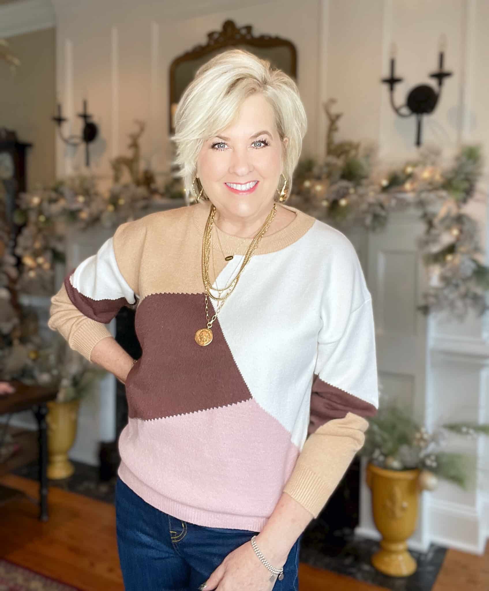 Over 40 Fashion Blogger, Tania Stephens is wearing a colorblock sweater from Amazon
