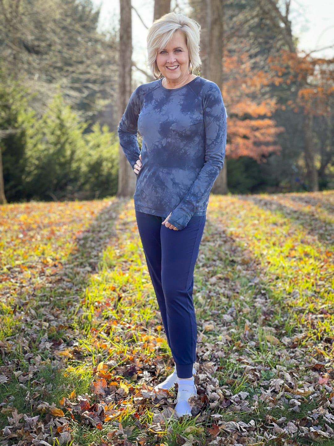 Over 40 Fashion Blogger, Tania Stephens is out for a walk in the woods in Zella activewear