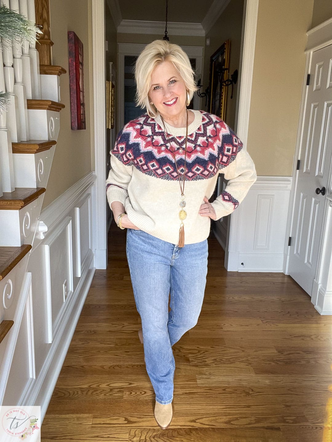 Over 40 Fashion Blogger, Tania Stephens is wearing a fairisle sweater and jeans look for fall
