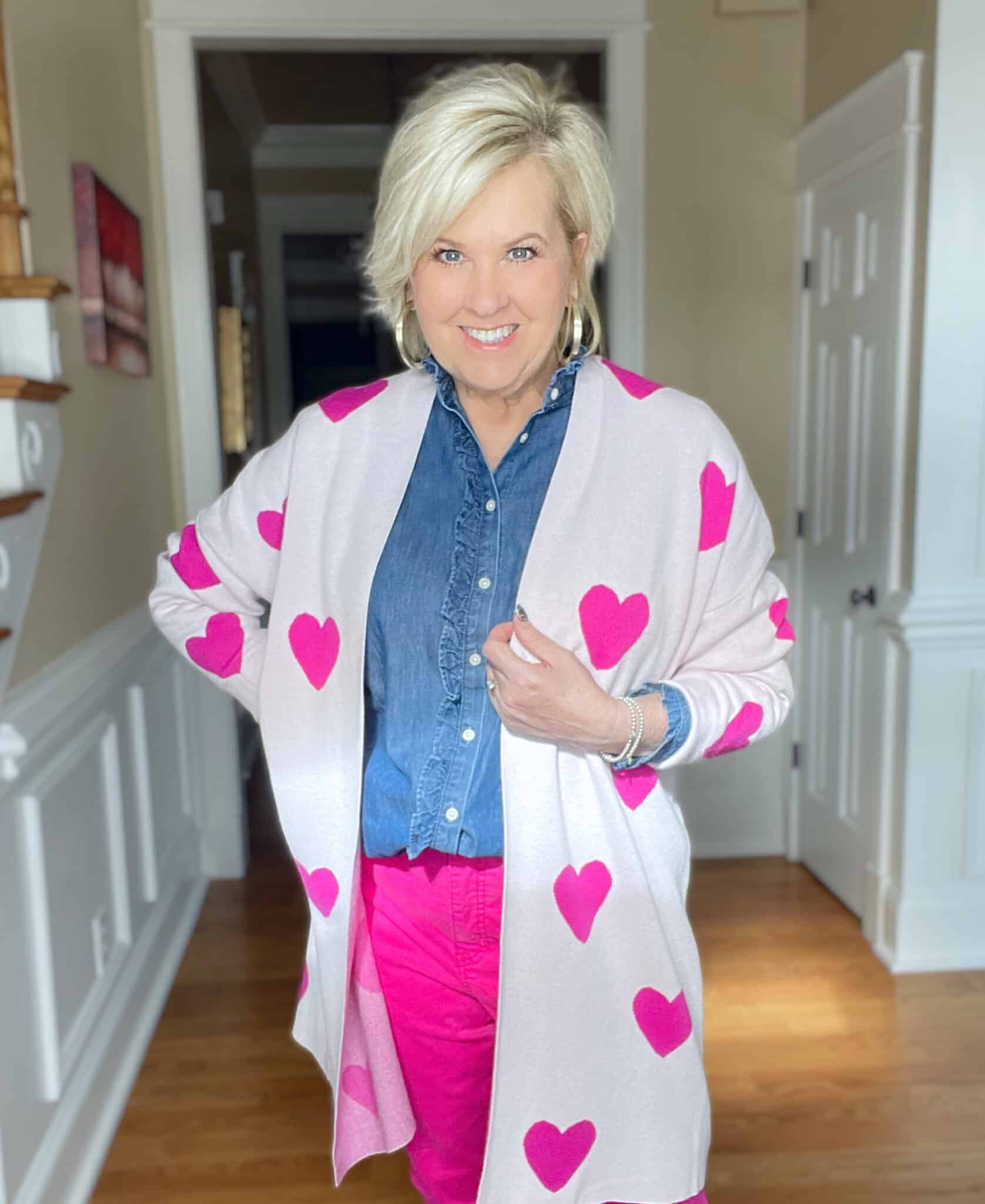 Over 40 Fashion Blogger, Tania Stephens is looking for love with her Valentine's Day cardigan, ruffled chambray shirt, and gold hoops