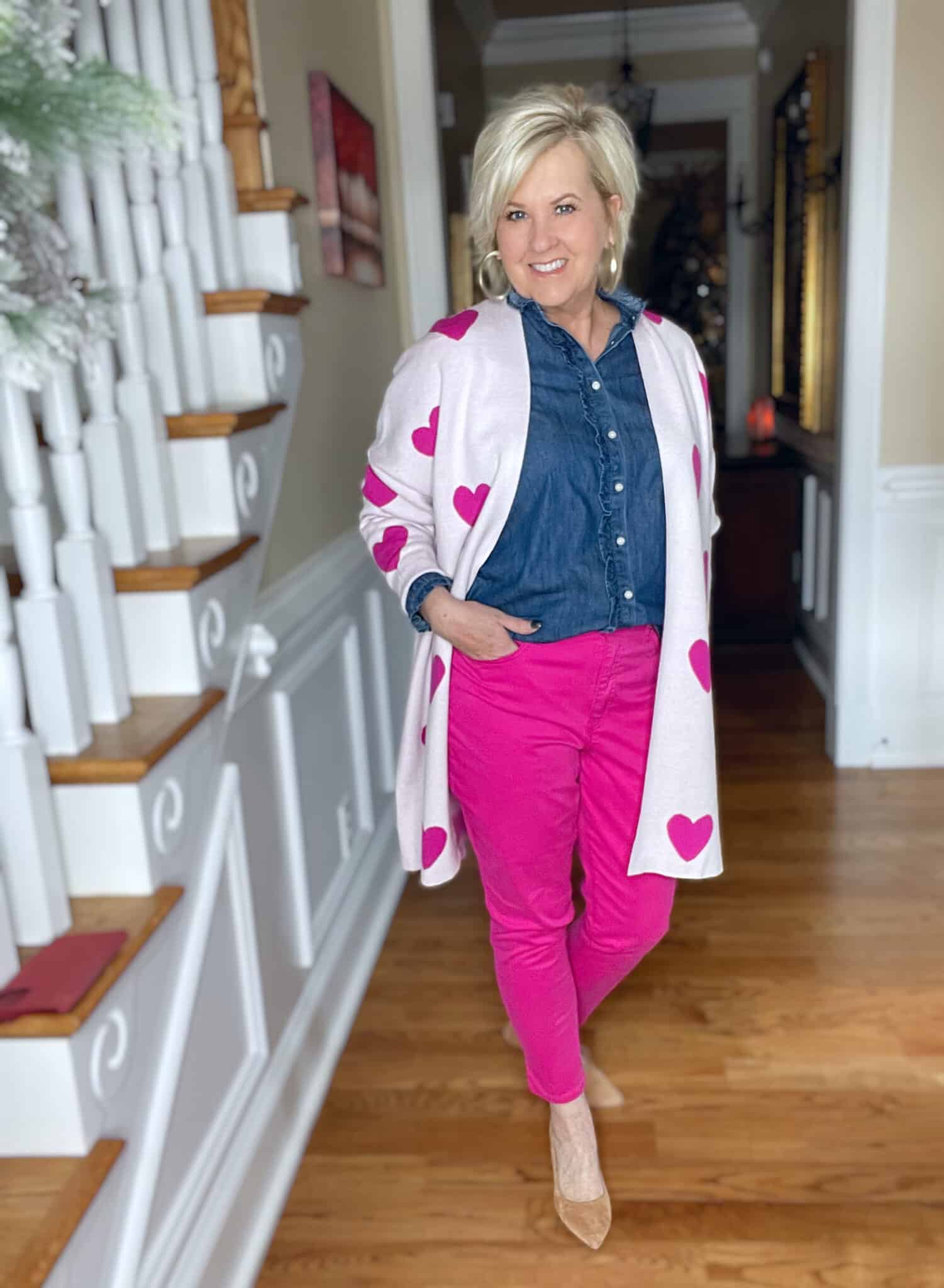 Over 40 Fashion Blogger, Tania Stephens is looking for love with her Valentine's Day cardigan, ruffled chambray shirt, and pink jeans