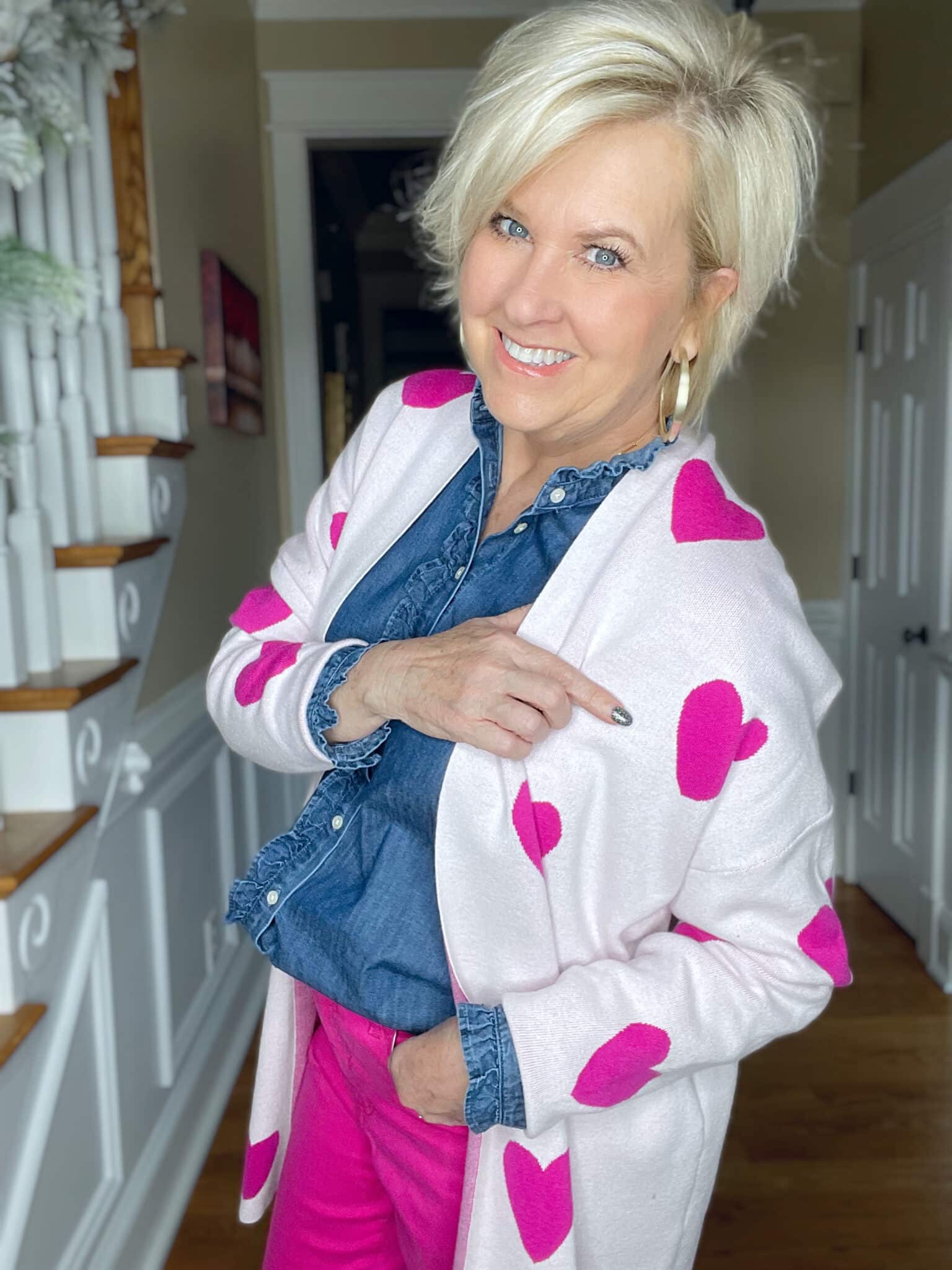 Over 40 Fashion Blogger, Tania Stephens is looking for love with her Valentine's Day pink heart cardigan from Belk