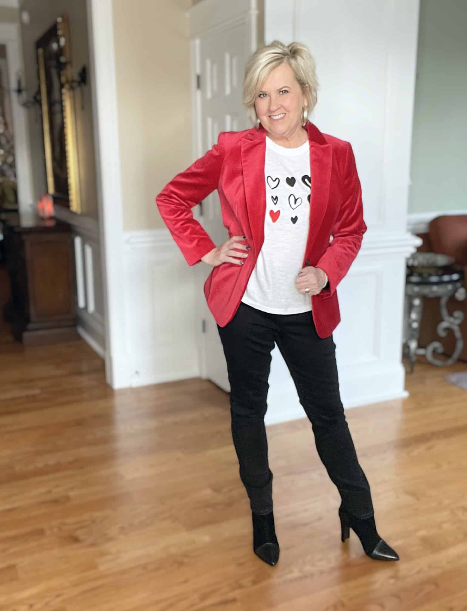Over 40 Fashion Blogger, Tania Stephens is looking for love with her Valentine's Day hearts tee, red velvet blazer, and black jeans and boots