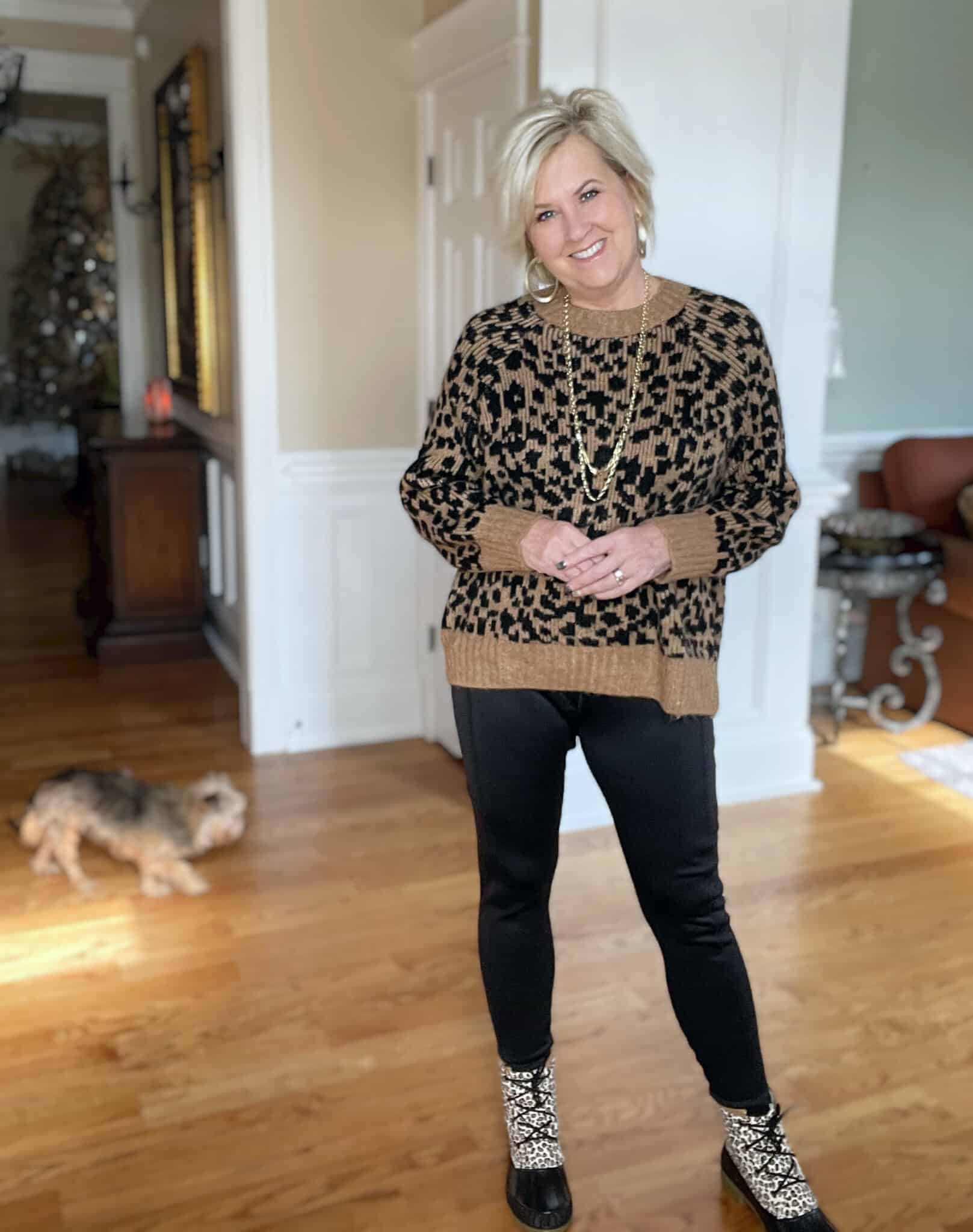 Over 40 Fashion Blogger, Tania Stephens is styling a leopard print sweater and black leggings from Old Navy