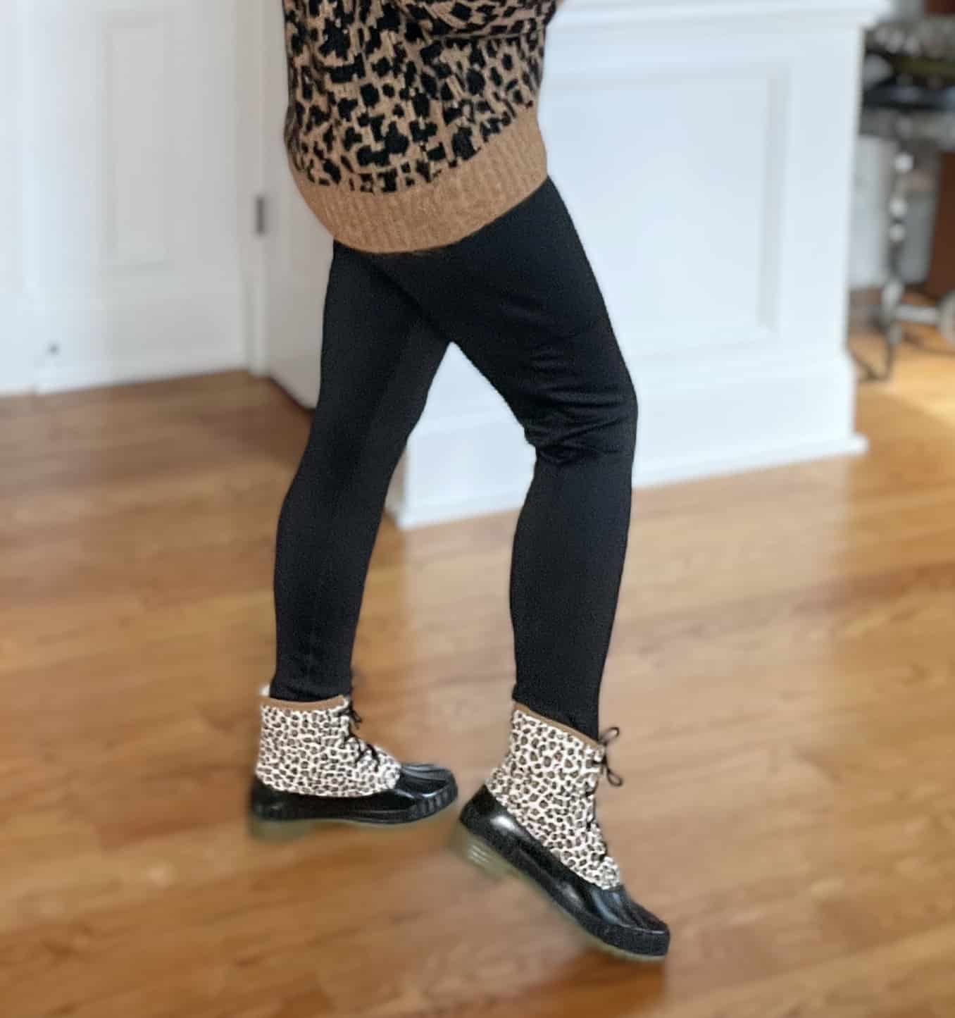 Over 40 Fashion Blogger, Tania Stephens is styling black leggings and leopard print duck boots