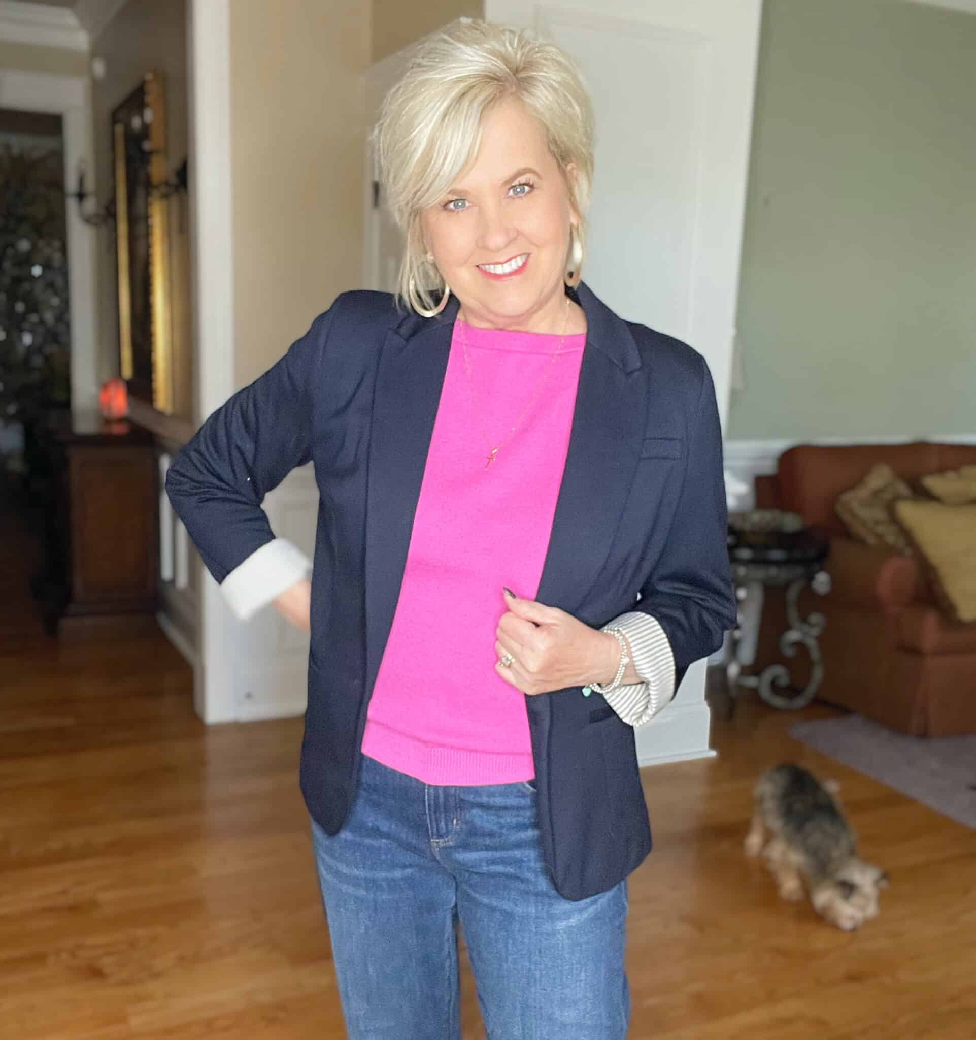Over 40 Fashion Blogger, Tania Stephens is wearing a pink boatneck sweater and a navy blazer
