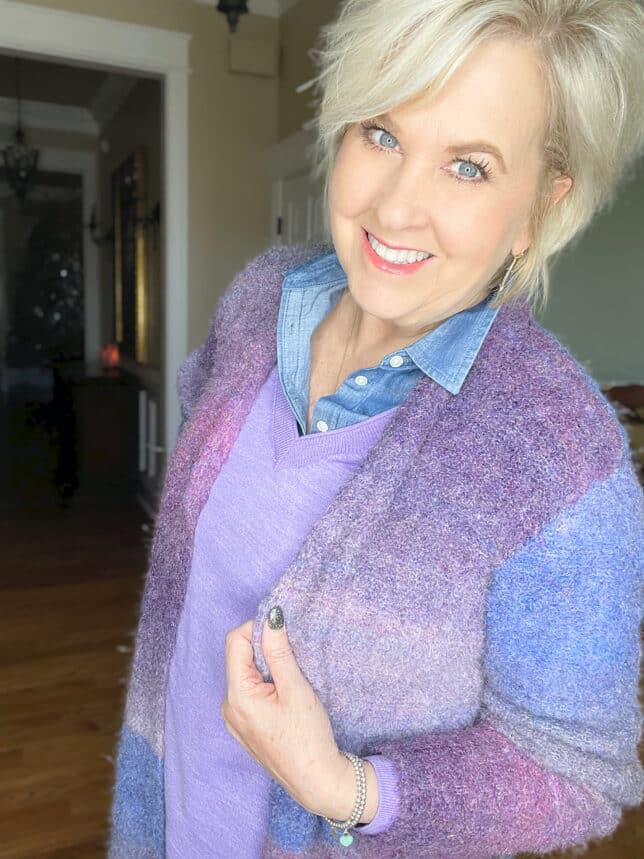 Over 40 Fashion Blogger, Tania Stephens is wearing a sweater in Very Peri with a denim shirt