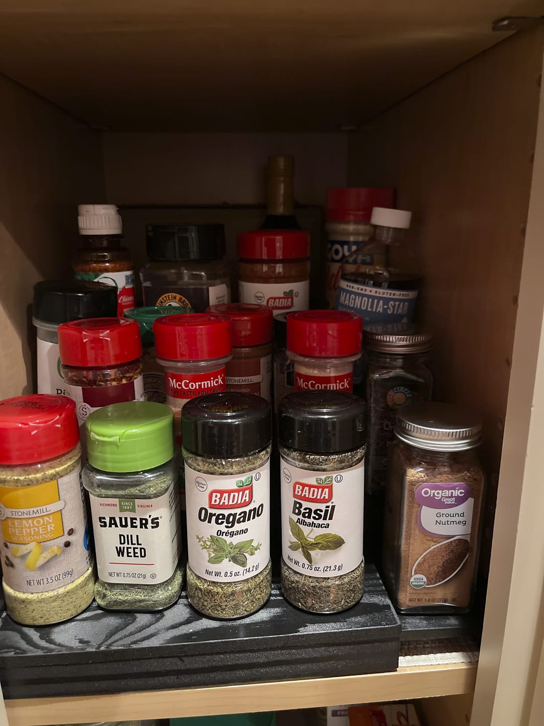 Over 40 Fashion Blogger, Tania Stephens is showing spice shelf organizers that she found on Amazon