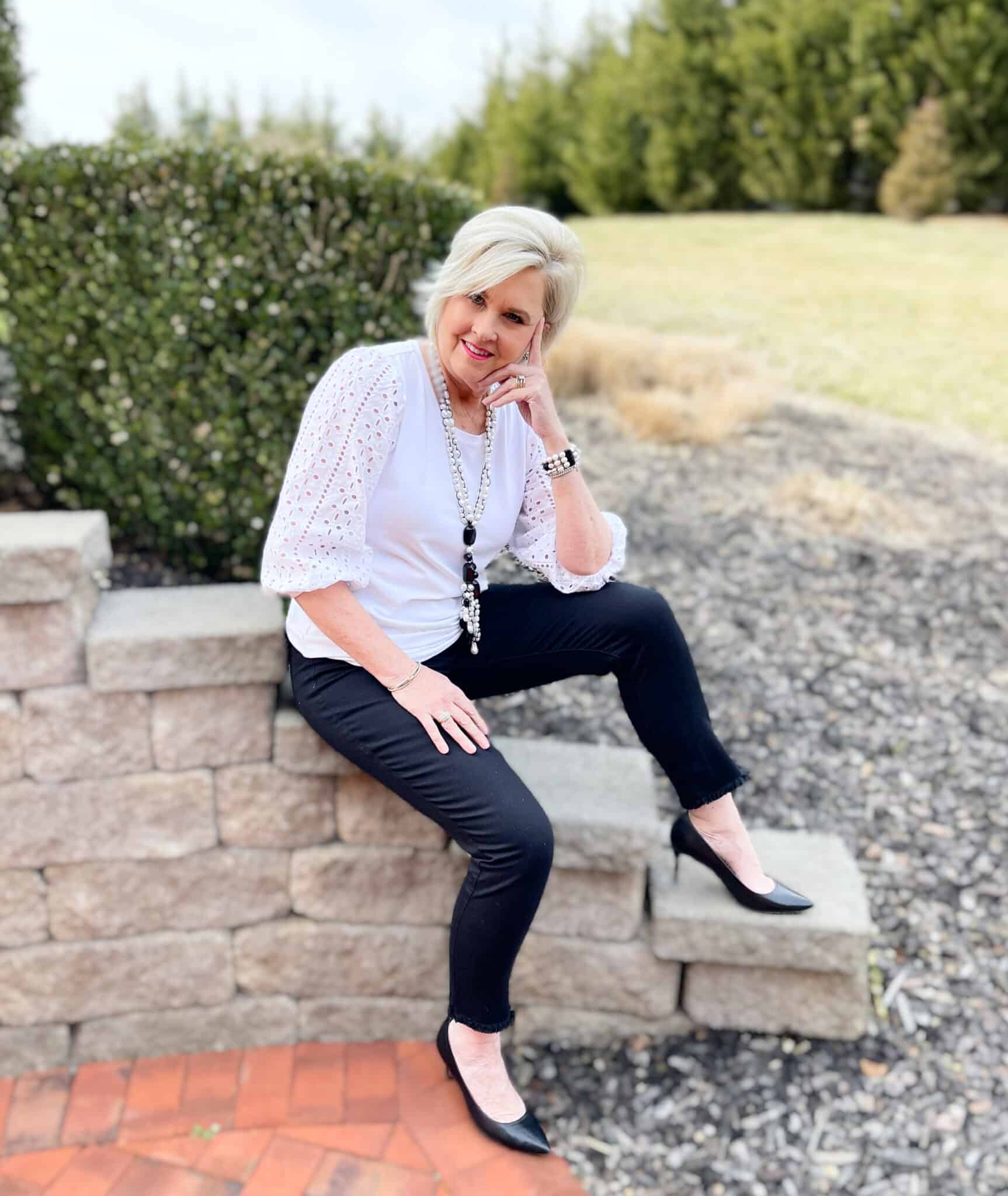 Over 40 Fashion Blogger, Tania Stephens is wearing black and white for spring