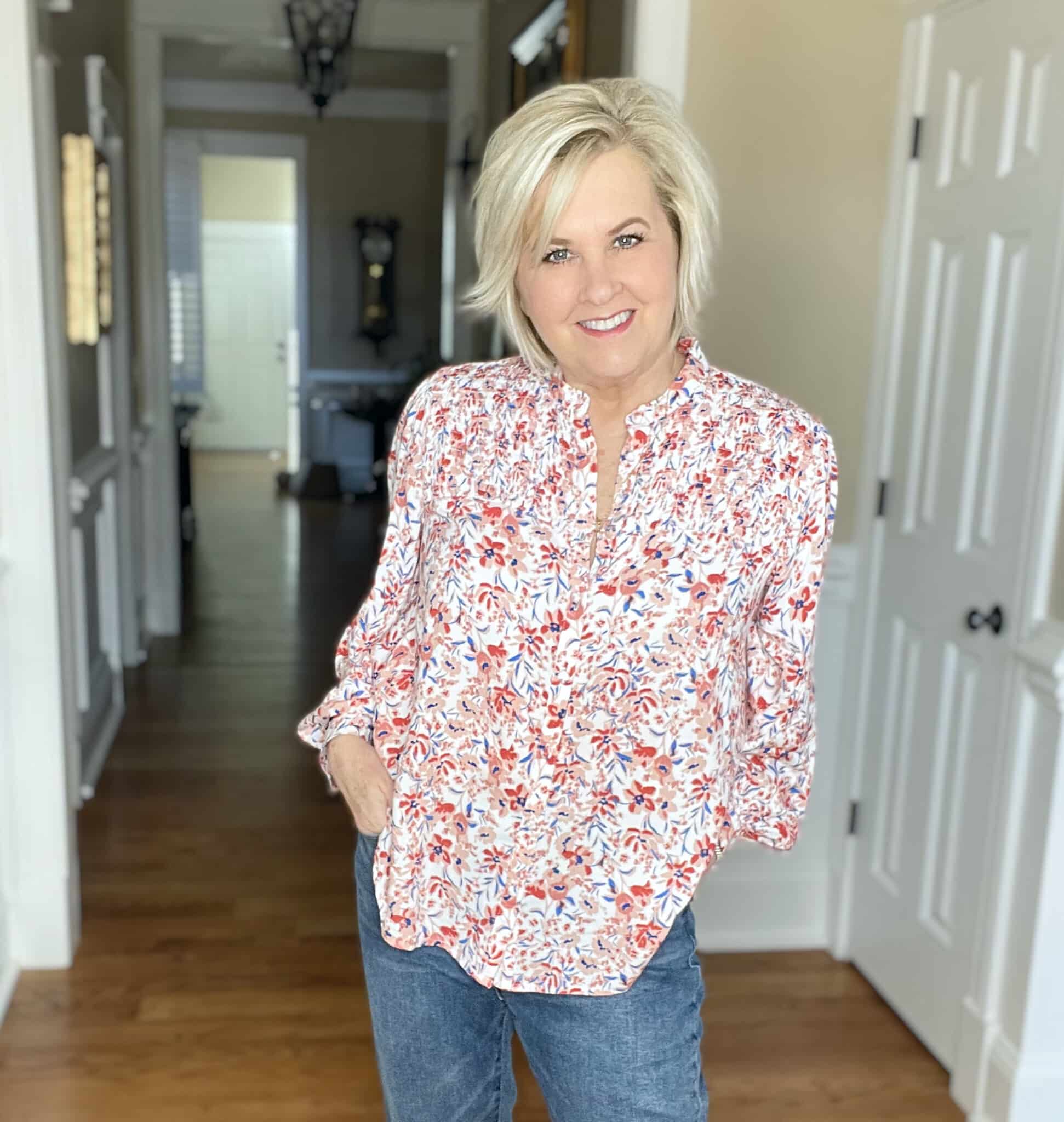 Over 40 Fashion Blogger, Tania Stephens is wearing a floral top 
