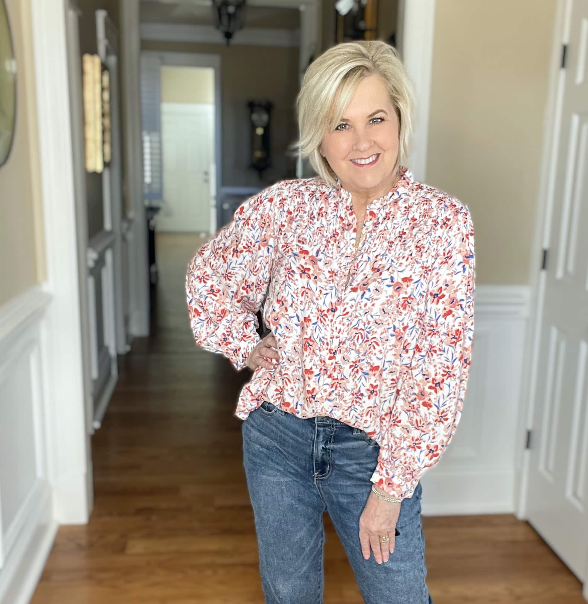 Over 40 Fashion Blogger, Tania Stephens is wearing a floral top from Walmat