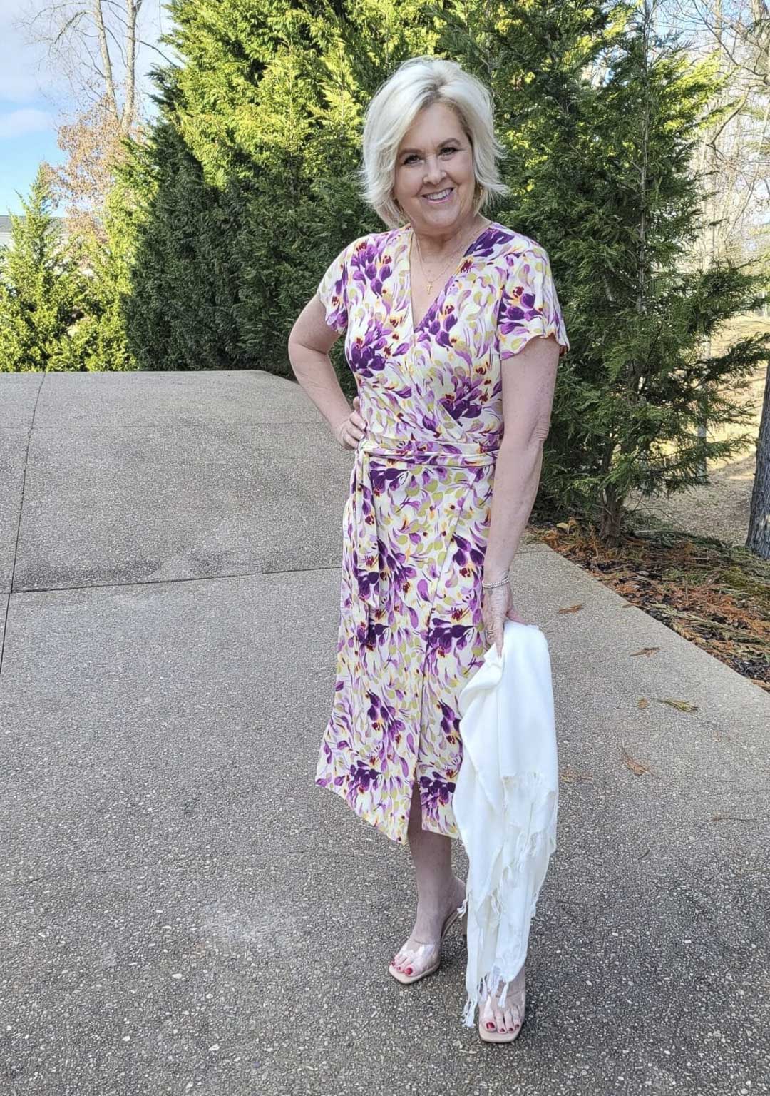 Over 40 Fashion Blogger, Tania Stephens is looking romantic in this floral dress and white wrap with nude heels from Nordstrom