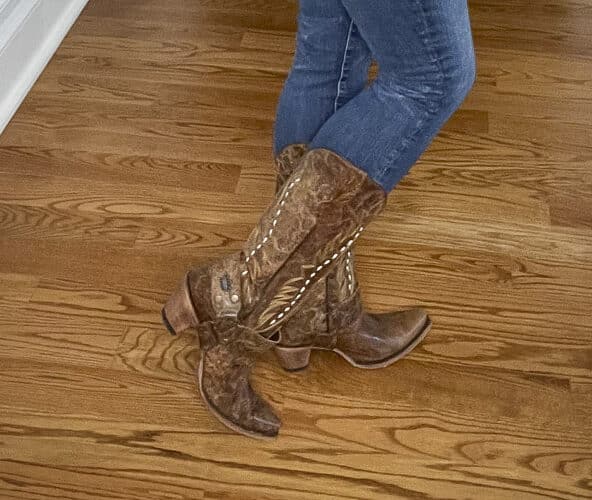 Over 40 Fashion Blogger, Tania Stephens is wearing cowboy boots