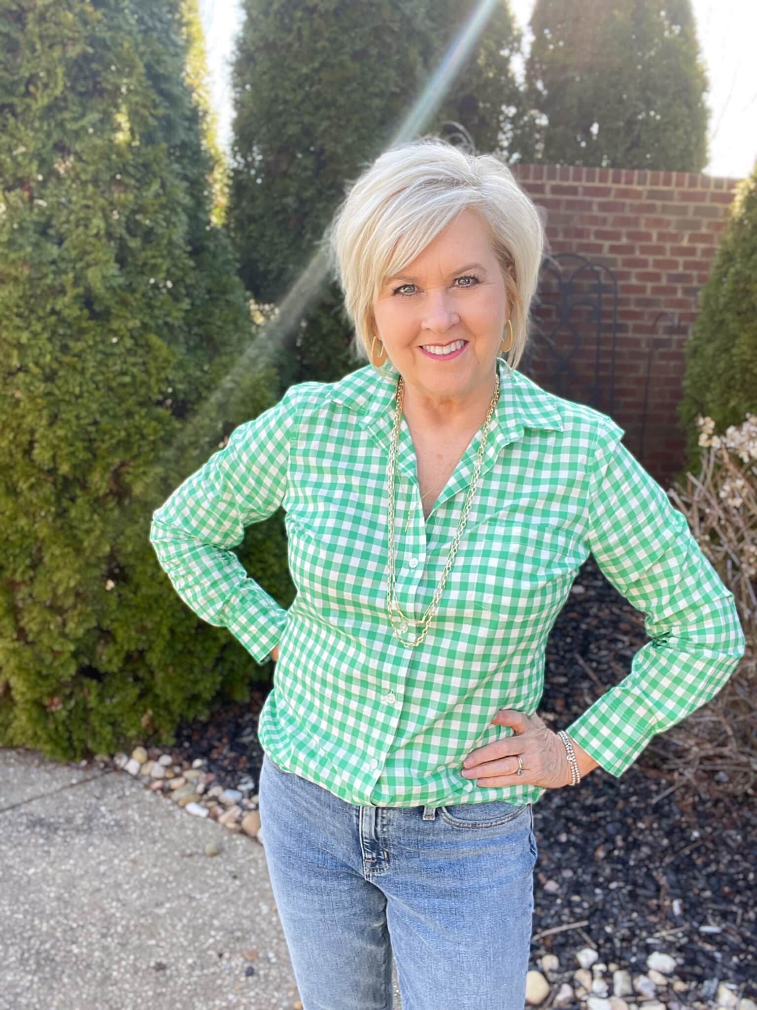 Over 40 Fashion Blogger, Tania Stephens is styling a green gingham button up shirt