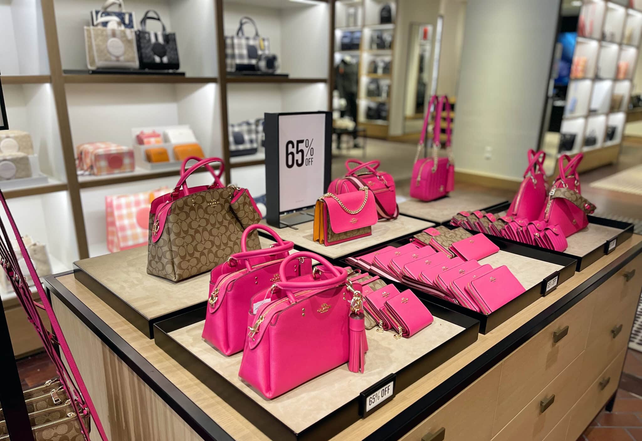 Over 40 Fashion Blogger, Tania Stephens is shopping at Coach Outlet in Asheville, NC