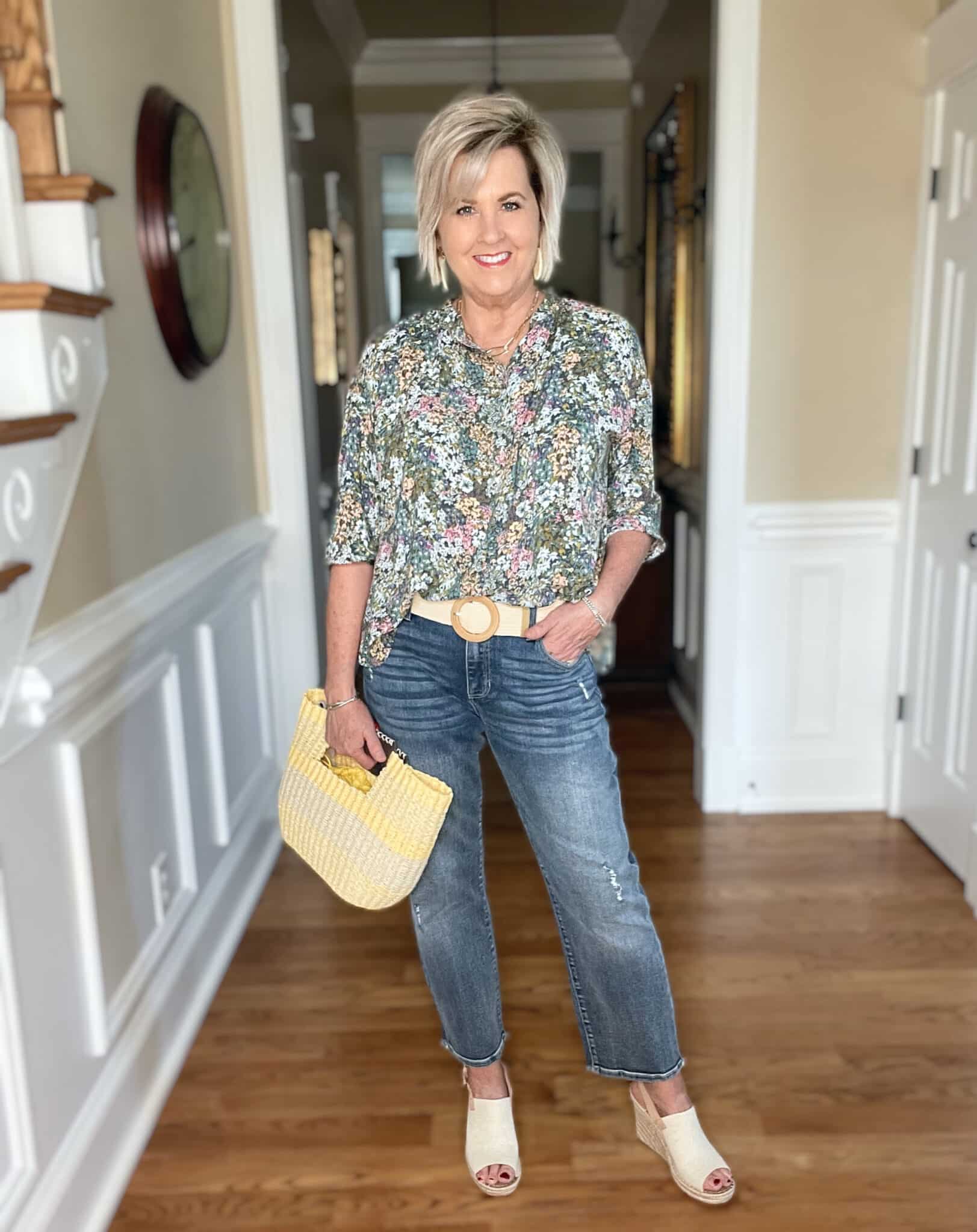 Over 40 Fashion Blogger, Tania Stephens is wearing a floral shirt from JJill with jeans and wedge shoes