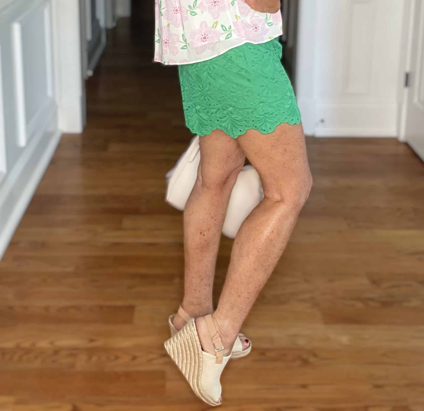 Over 40 Fashion Blogger, Tania Stephens is wearing a feminine pink top with green pants from Kohl's18