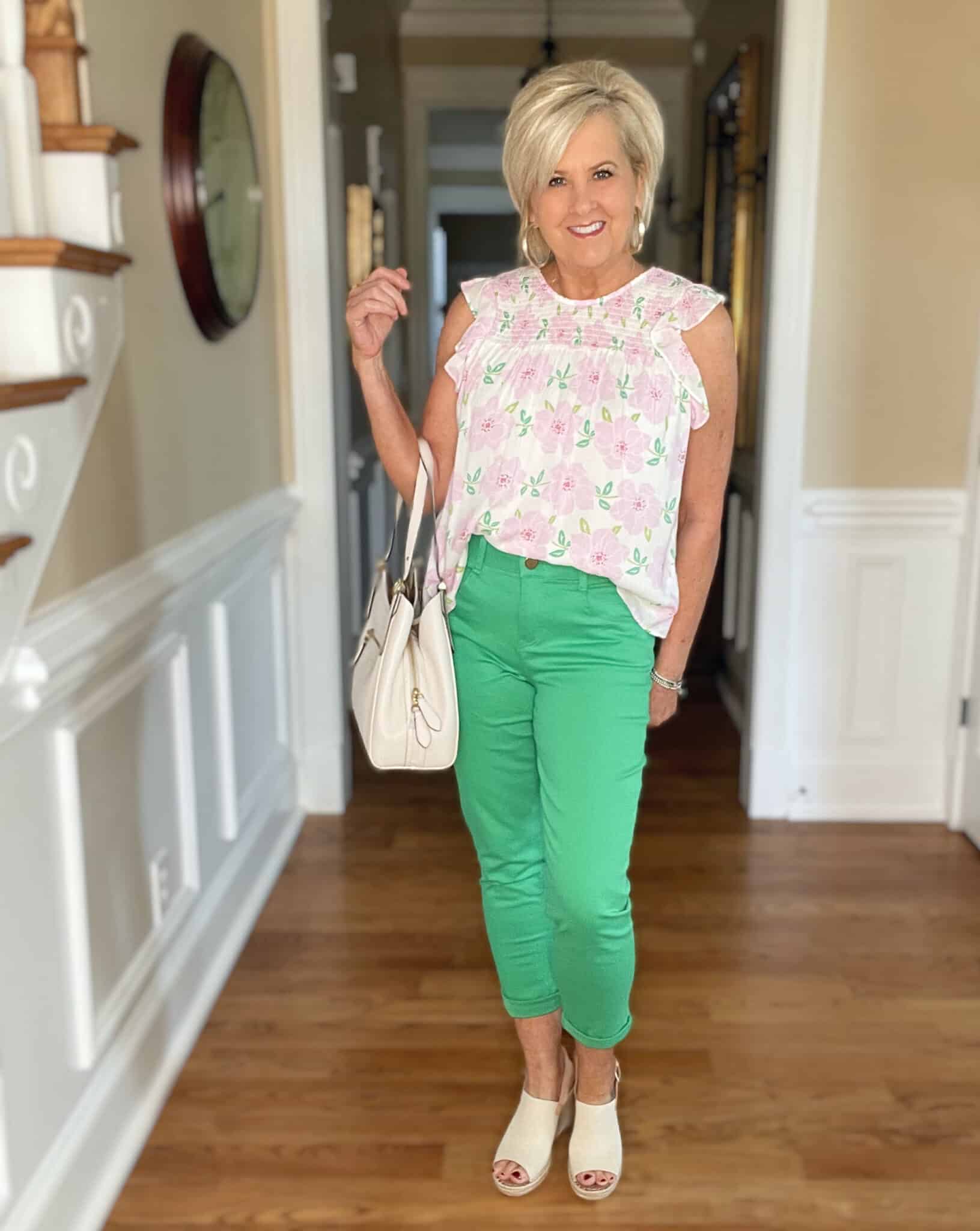 Over 40 Fashion Blogger, Tania Stephens is wearing a feminine pink top with green pants from Kohl's3