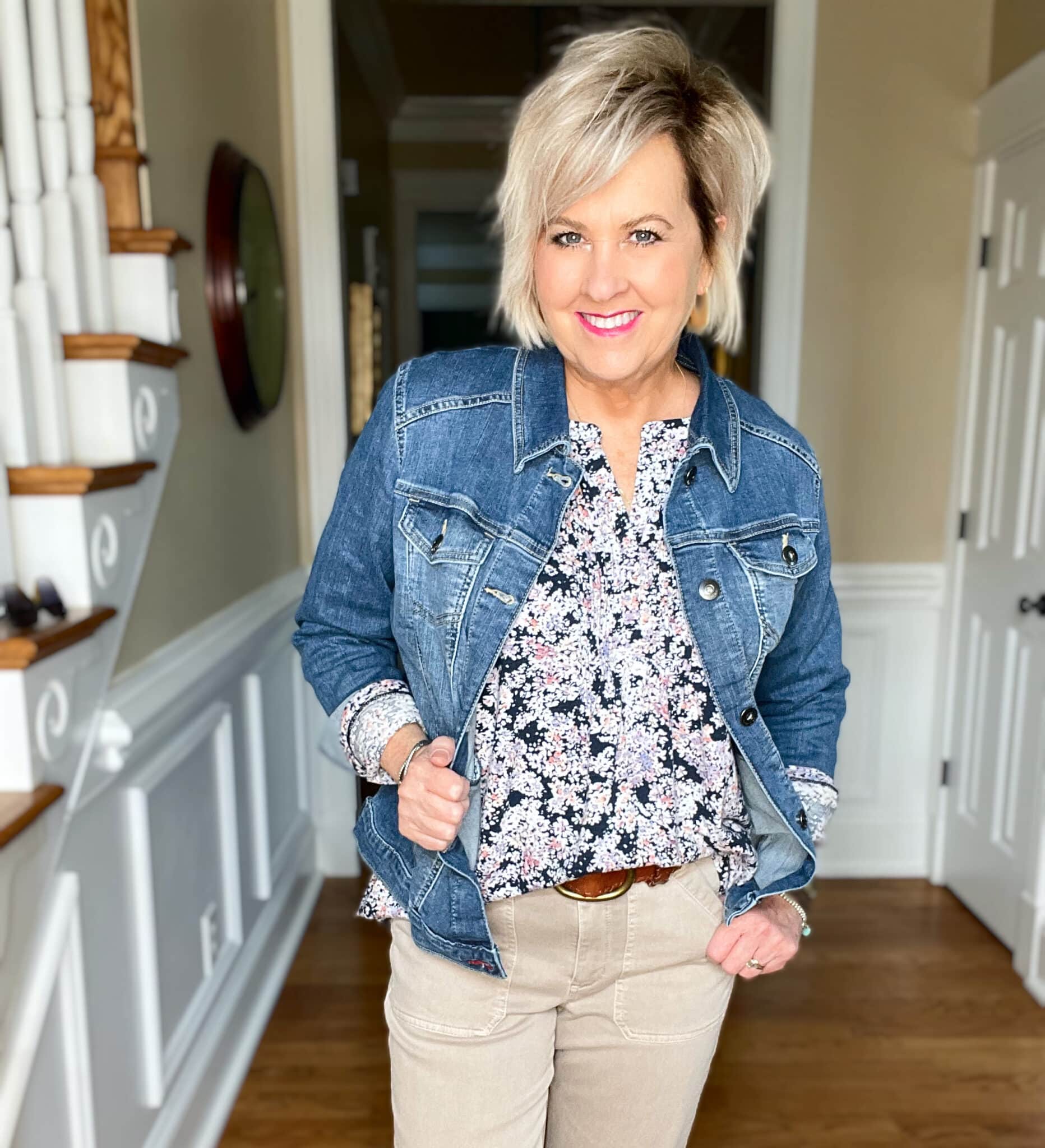 Over 40 Fashion Blogger, Tania Stephens is wearing a floral top and beige pants from JJill with a denim jacket10
