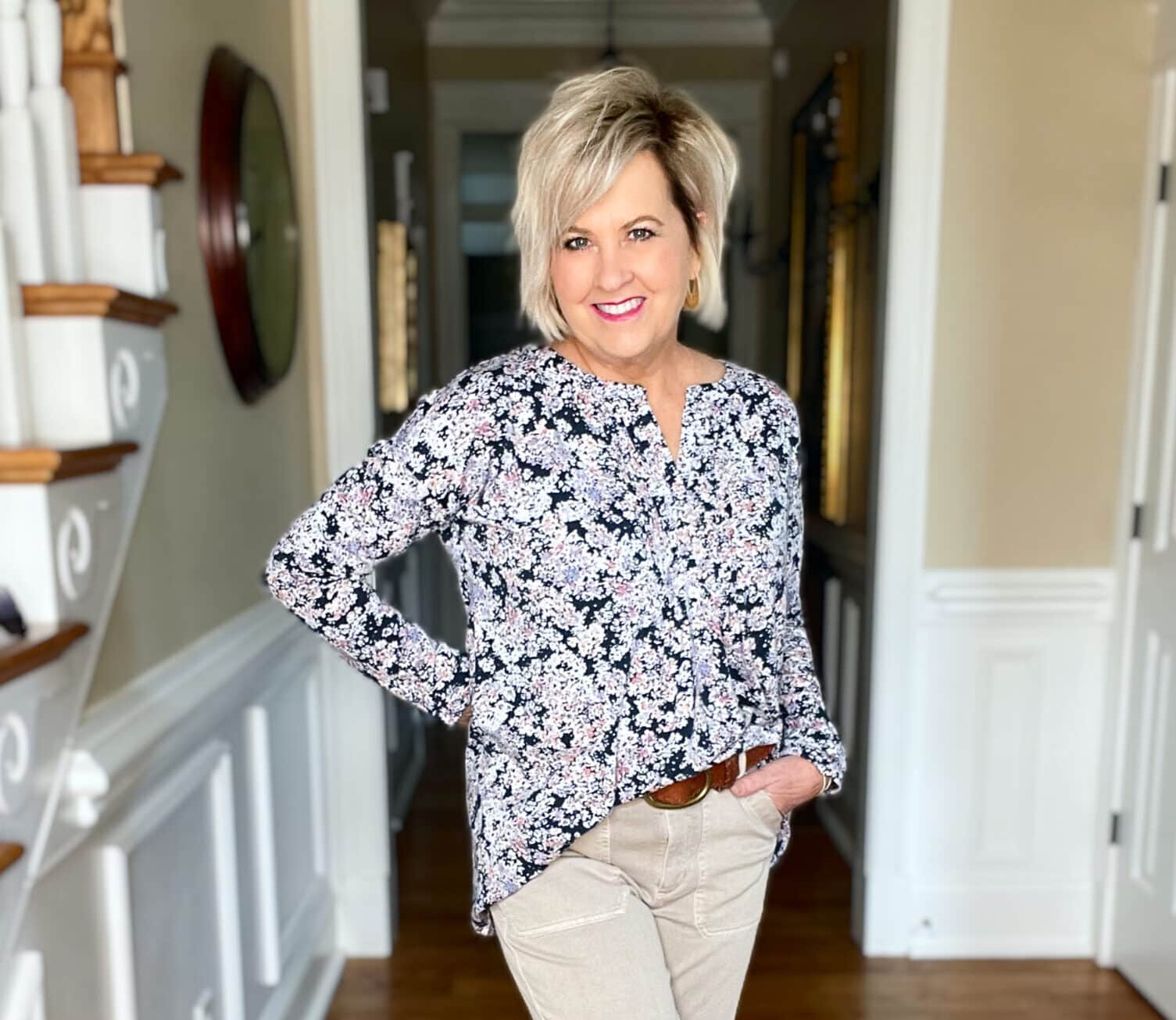 Over 40 Fashion Blogger, Tania Stephens is wearing a floral top and beige pants from JJill with a denim jacket12