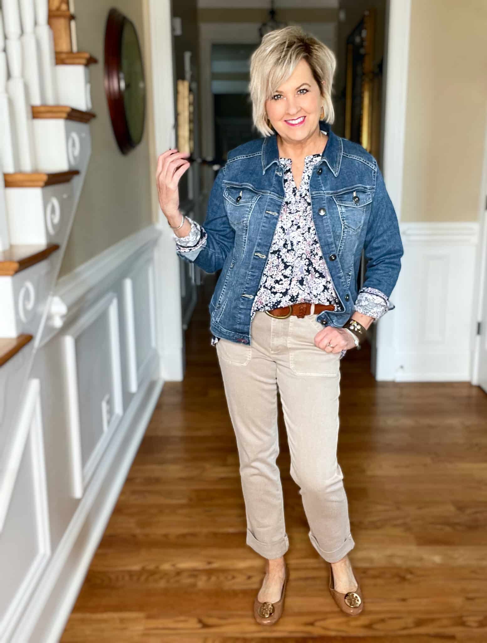 Over 40 Fashion Blogger, Tania Stephens is wearing a floral top and beige pants from JJill with a denim jacket15