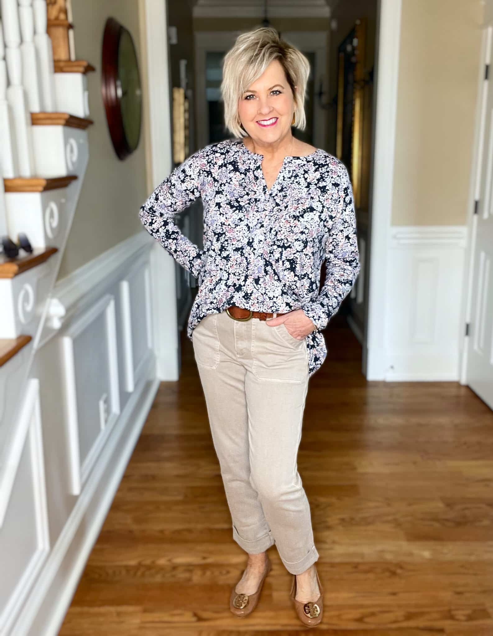 Over 40 Fashion Blogger, Tania Stephens is wearing a floral top and beige pants from JJill with a denim jacket1