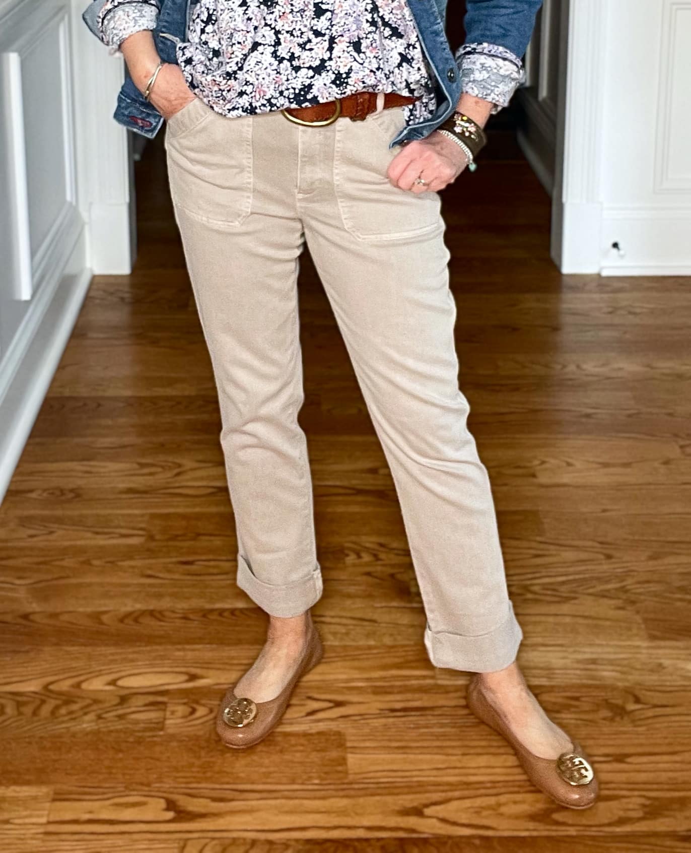 Over 40 Fashion Blogger, Tania Stephens is wearing a floral top and beige pants from JJill with a denim jacket7