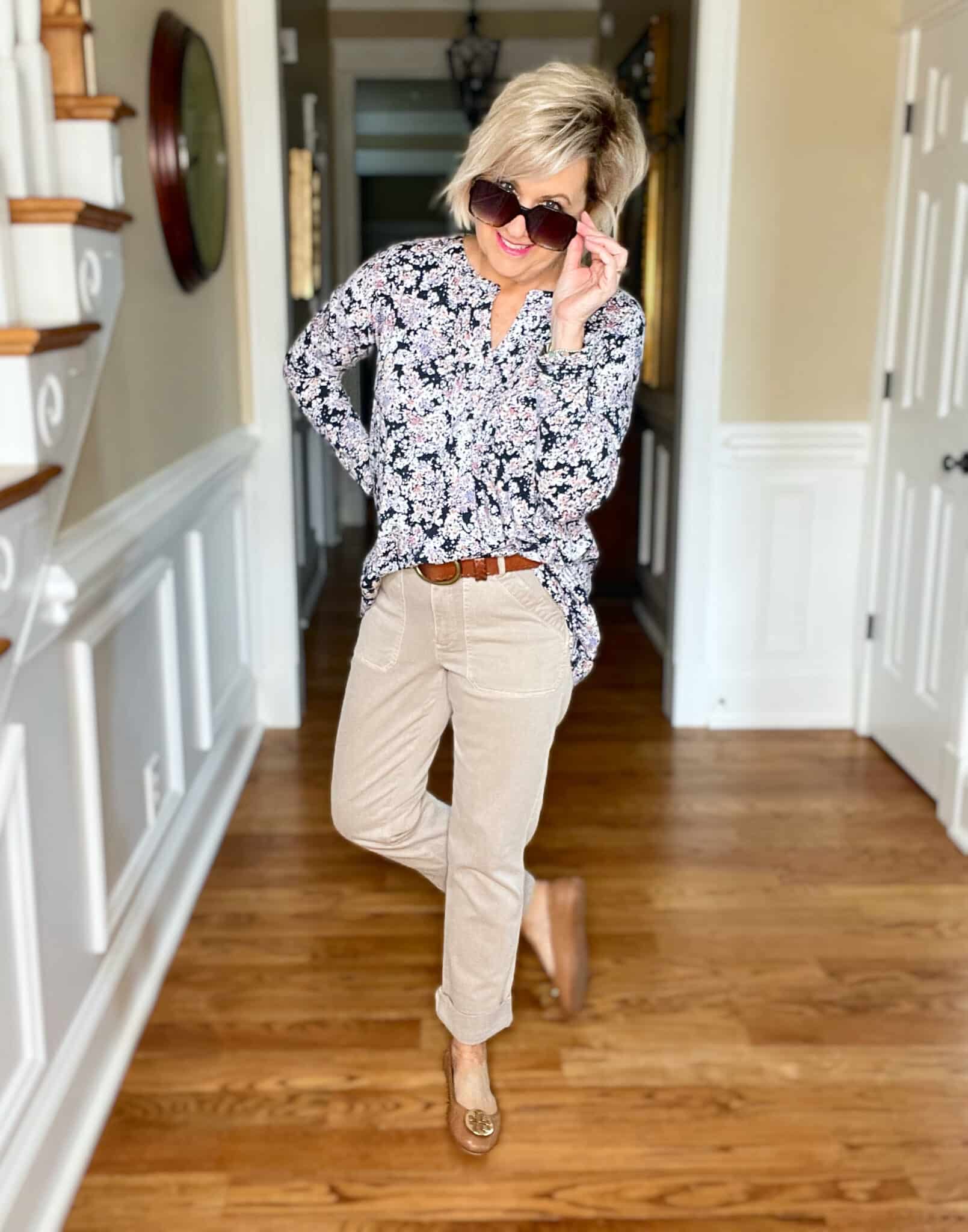 Over 40 Fashion Blogger, Tania Stephens is wearing a floral top and beige pants from JJill with a denim jacket8