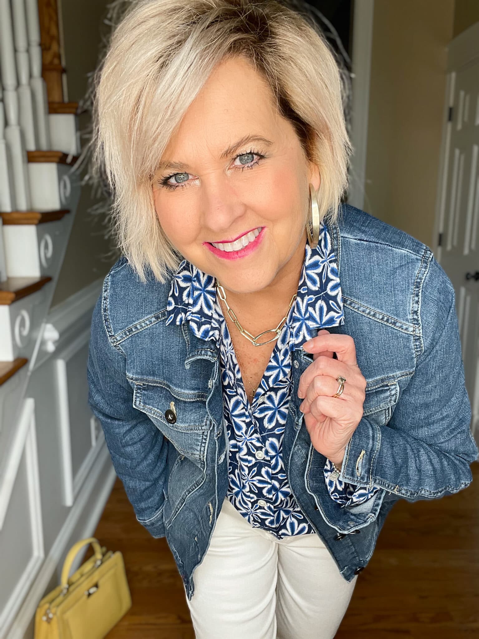 Over 40 Fashion Blogger, Tania Stephens is wearing white crop jeans and a button up blue print shirt16