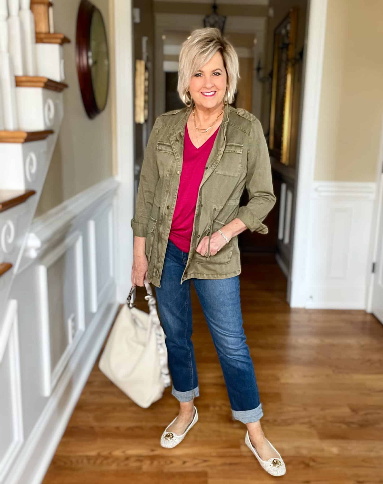 Over 40 Fashion Blogger, Tania Stephens is wearing a bright pink tee with cuffed jeans and loafers20