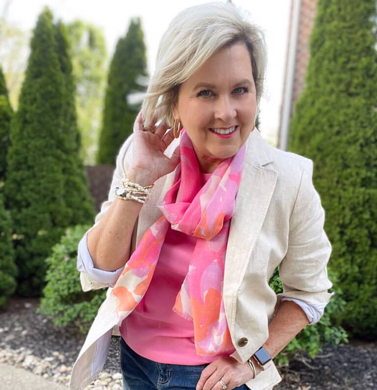 Over 40 Fashion Blogger, Tania Stephens is wearing a pink floral sleeveless top with pink Bermuda shorts 29
