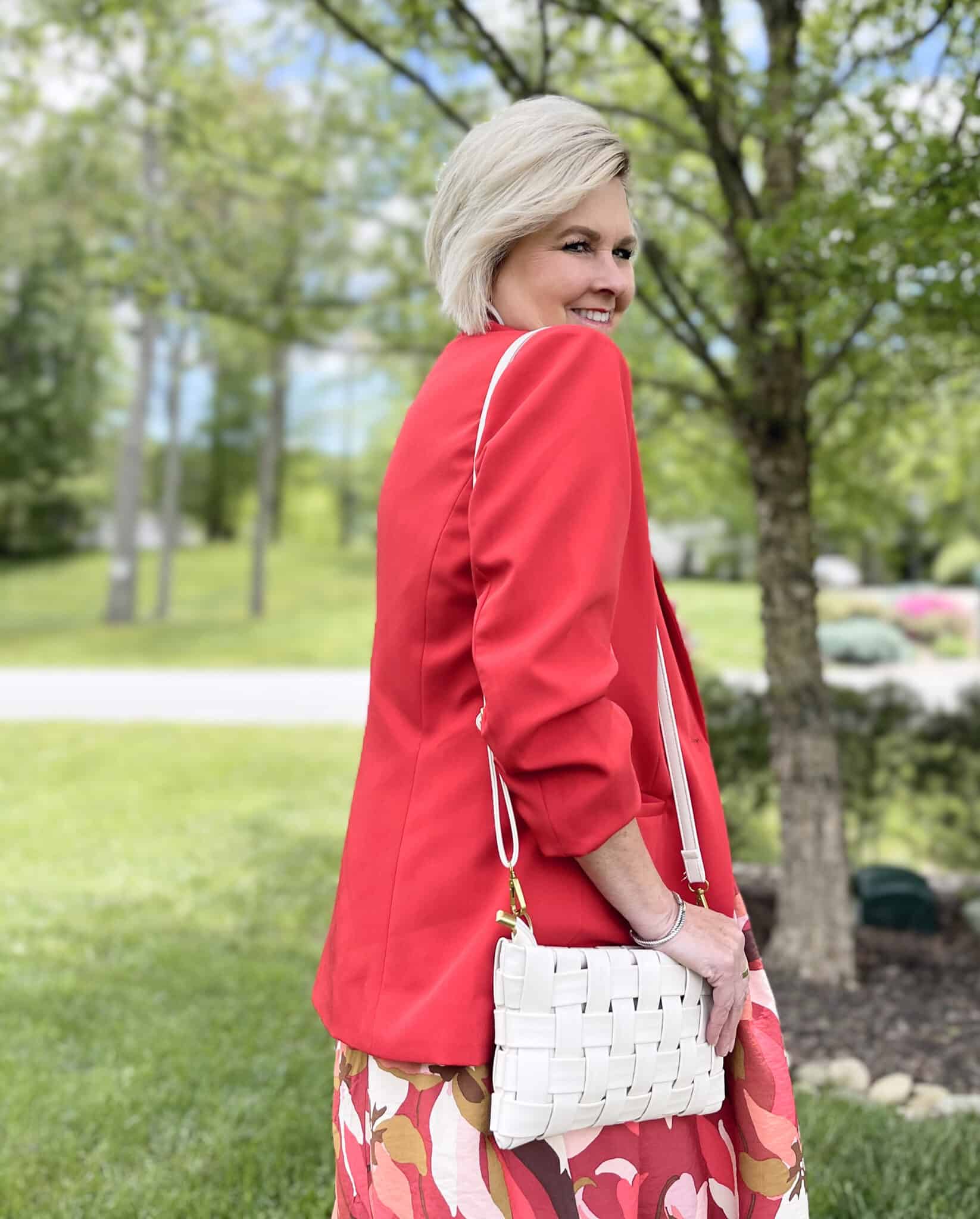Over 40 Fashion Blogger, Tania Stephens is celebrating 2022 Mother's Day in a Floral dress from Target and a red blazer from Amazon3