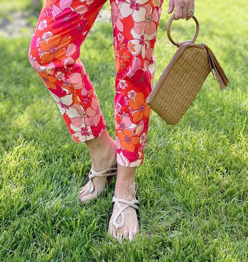 Over 40 Fashion Blogger, Tania Stephens is wearing floral pants, and white tee, and a denim jacket11