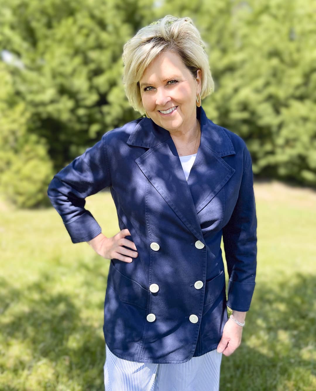 Over 40 Fashion Blogger, Tania Stephens is wearing a navy double breasted blazer and striped pants from Free Assembly at Walmart9