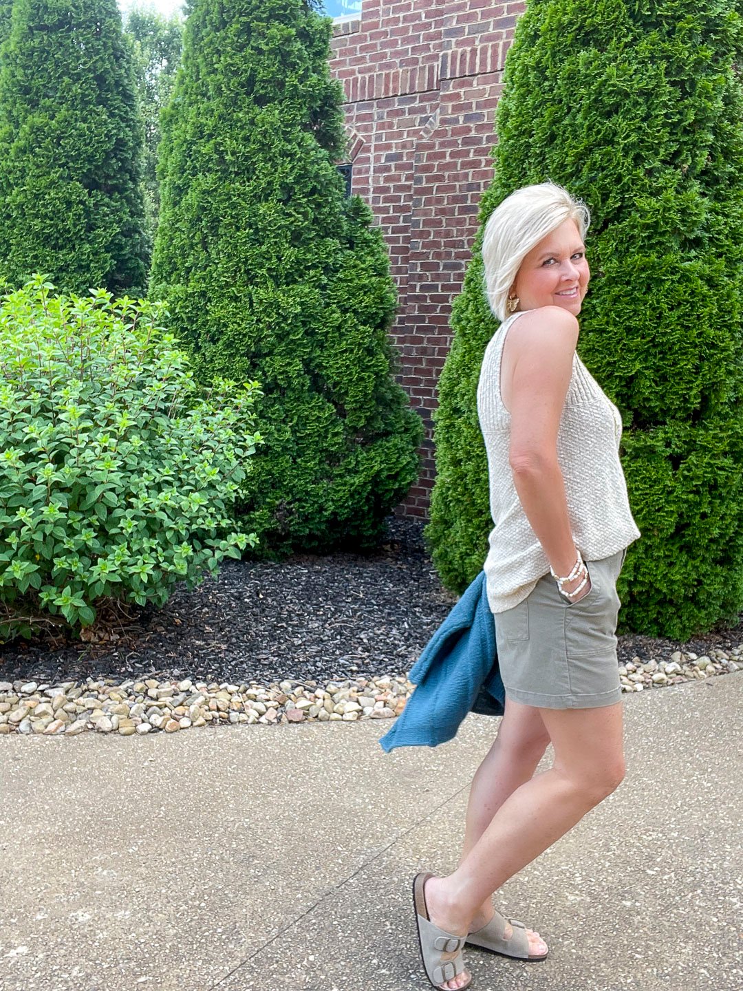 Over 40 Fashion Blogger, Tania Stephens is styling an outfit in shades of green24