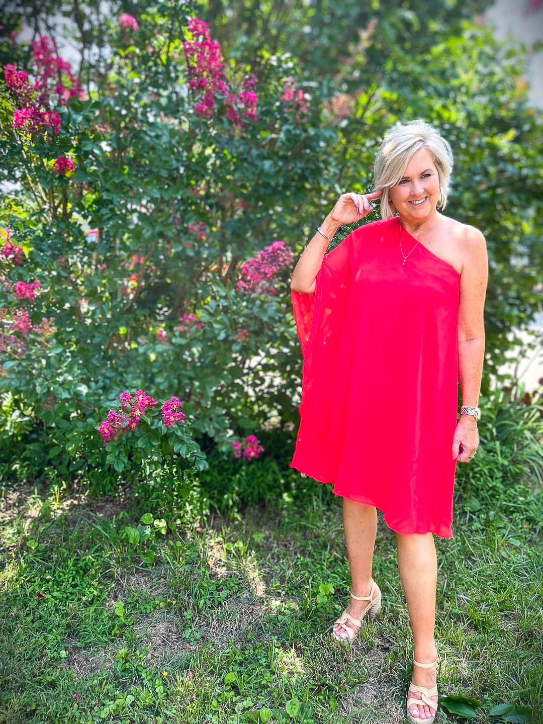 Over 40 Fashion Blogger, Tania Stephens is ready for the red carpet in this one shoulder red chiffon dress2