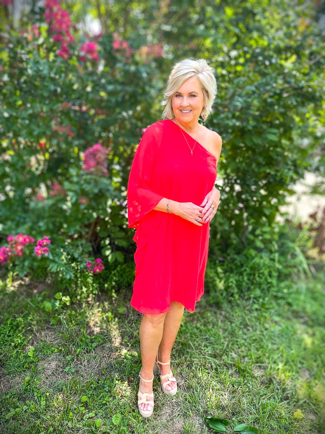 Over 40 Fashion Blogger, Tania Stephens is ready for the red carpet in this one shoulder red chiffon dress 5