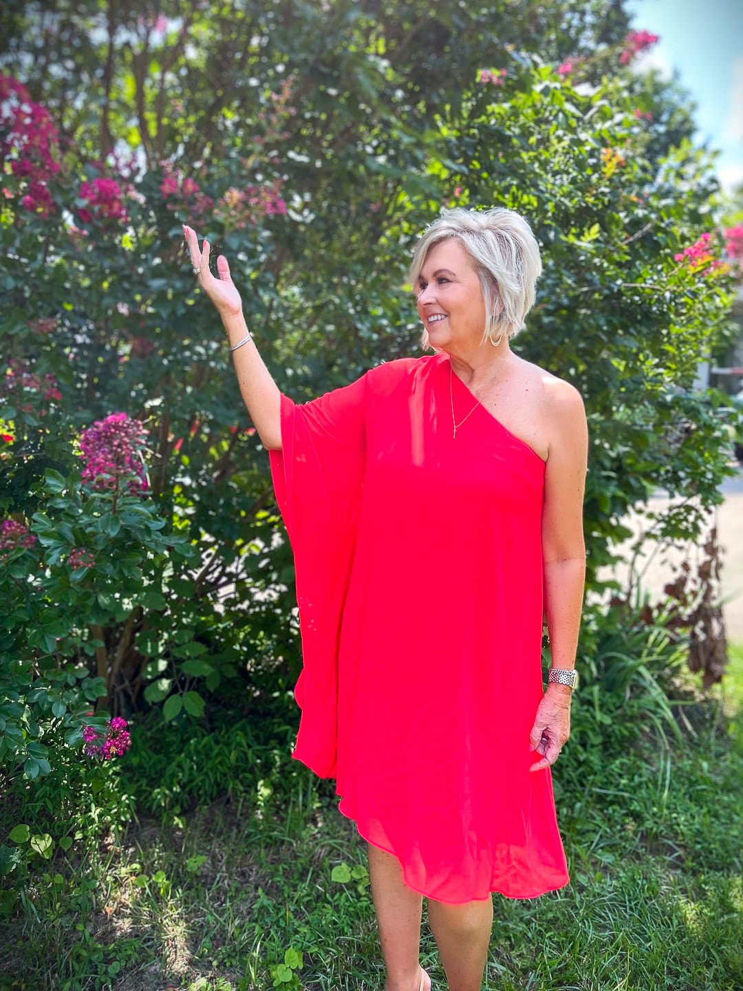 Over 40 Fashion Blogger, Tania Stephens is ready for the red carpet in this one shoulder red chiffon dress6